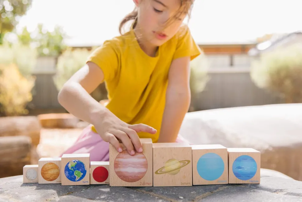 The Freckled Frog Playing with Planets